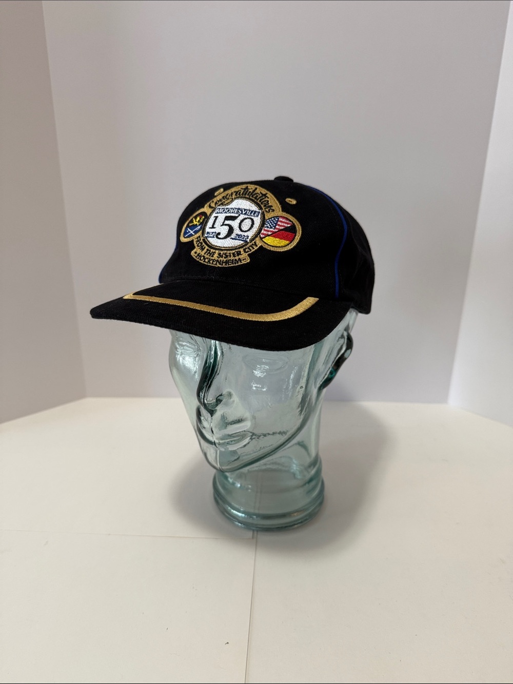 Mooresville 150th Anniversary Black Baseball Cap with Gold Embroidery